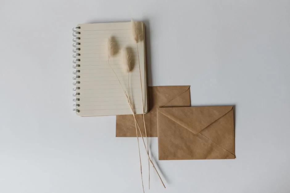 Open planner with Hashtag Campaign handwritten next to keyboard. Ideal for social media and productivity themes.